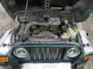 2000 Jeep Wrangler SE с VIN 1J4FA29P7YP788923, выставлен на аукционе Copart как лот 45281235 с пробегом 153 691 миль миль и Списание • Salvage title. История ставок и продаж доступна на DreamBid. Изображение 12.