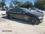 2015 BMW 7 Series 740Li xDrive with VIN WBAYF4C50FD874041, listed as a Copart auction lot 81666074 with 156,802 mi miles and Salvage title. Bid and sale history available at DreamBid. Image 4.