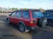 1997 Nissan Pathfinder XE z VIN JN8AR05Y2VW115250, wystawiony jako IAAI lot #42021906 z przebiegiem 168 395 mil mil oraz . Historia ofert i sprzedaży dostępna na DreamBid. Obrazek 3.