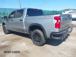 2024 Chevrolet Silverado 1500 LT Trail Boss with VIN 3GCUDFE83RG232785, listed as a IAAI auction lot 43171218 with 26,157 mi miles and . Bid and sale history available at DreamBid. Image 3.