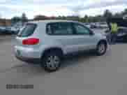 2014 Volkswagen Tiguan S with VIN WVGBV3AXXEW596502, listed as a IAAI auction lot 43538779 with 111,908 mi miles and . Bid and sale history available at DreamBid. Image 4.