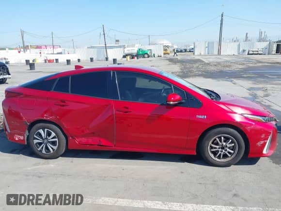 2018 Toyota Prius Plus z VIN JTDKARFP7J3075941, wystawiony jako IAAI lot #43061890 z przebiegiem 117 714 mil mil oraz . Historia ofert i sprzedaży dostępna na DreamBid. Obrazek 13.