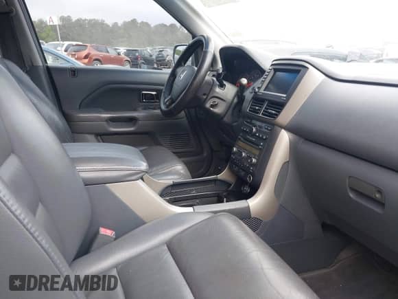 2006 Honda Pilot EX-L z VIN 5FNYF28746B047427, wystawiony jako IAAI lot #42143088 z przebiegiem 154 272 mil mil oraz . Historia ofert i sprzedaży dostępna na DreamBid. Obrazek 5.