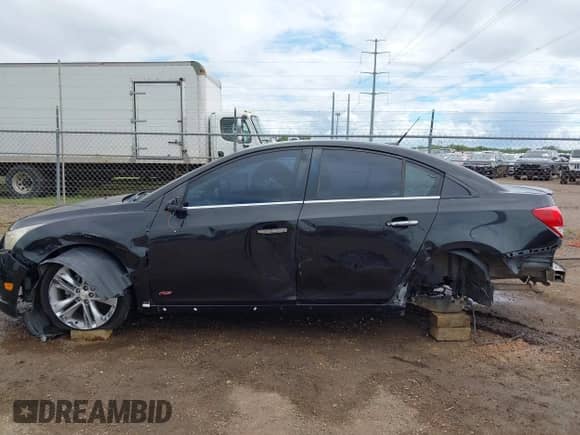 2014 Chevrolet Cruze LTZ with VIN 1G1PG5SB4E7168057, listed as a IAAI auction lot 43437947 with 145,021 mi miles and . Bid and sale history available at DreamBid. Image 15.
