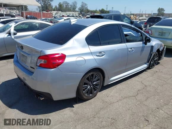 2017 Subaru WRX z VIN JF1VA1B66H9833583, wystawiony jako IAAI lot #43067415 z przebiegiem 80 509 mil mil oraz . Historia ofert i sprzedaży dostępna na DreamBid. Obrazek 4.