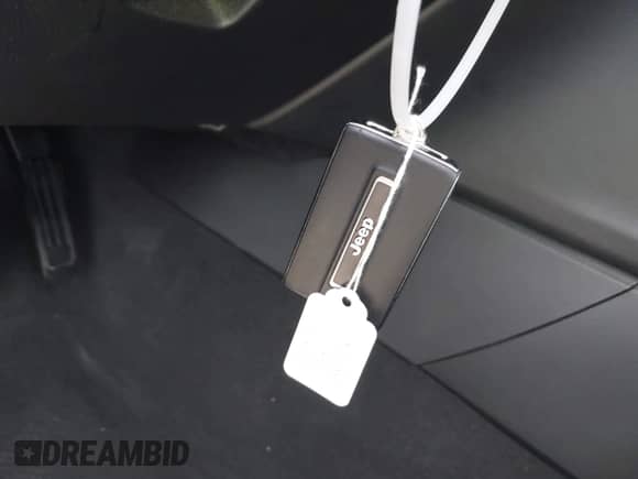 2023 Jeep Grand Cherokee Altitude with VIN 1C4RJKAG4P8847885, listed as a IAAI auction lot 42346718 with 52,318 mi miles and . Bid and sale history available at DreamBid. Image 11.