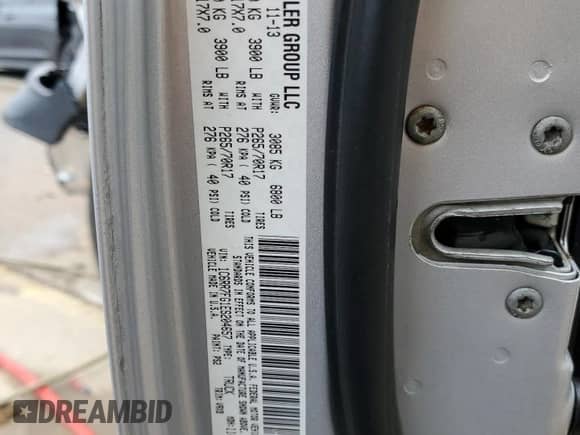 2014 Ram 1500 Tradesman with VIN 1C6RR7FG1ES204657, listed as a Copart auction lot 50946195 with 112,572 mi miles and Salvage title. Bid and sale history available at DreamBid. Image 13.