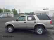 2000 Chevrolet Blazer LT z VIN 1GNDT13W9YK287456, wystawiony jako IAAI lot #42450504 z przebiegiem 139 649 mil mil oraz . Historia ofert i sprzedaży dostępna na DreamBid. Obrazek 14.
