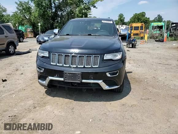 2014 Jeep Grand Cherokee Summit with VIN 1C4RJFJT4EC508994, listed as a Copart auction lot 66526655 with 107,657 mi miles and Salvage title. Bid and sale history available at DreamBid. Image 14.