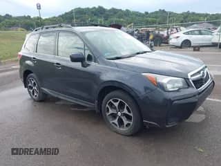 2014 Subaru Forester XT Premium with VIN JF2SJGDC1EH504103, listed as a IAAI auction lot 43126816 with 181,812 mi miles and . Bid and sale history available at DreamBid. Image 1.