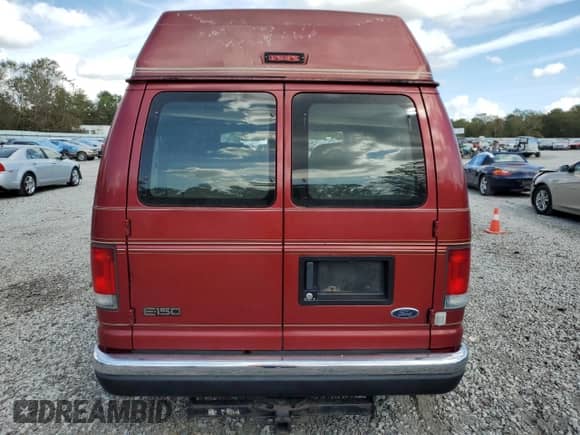 1999 Ford Econoline Cargo with VIN 1FDRE14W5XHB72755, listed as a Copart auction lot 78891634 with 136,376 mi miles and Salvage title. Bid and sale history available at DreamBid. Image 6.