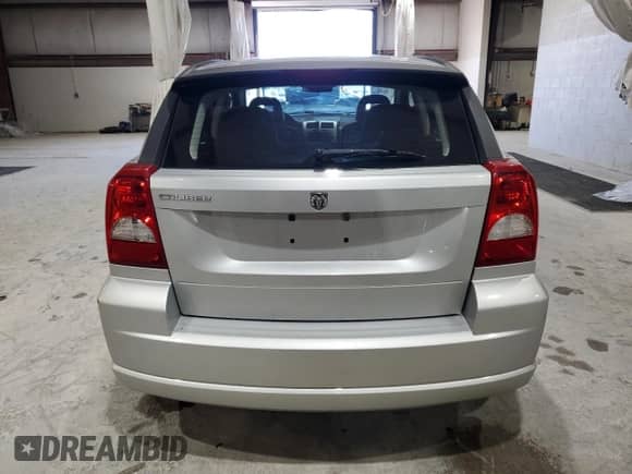 2008 Dodge Caliber SE with VIN 1B3HB28B78D779417, listed as a Copart auction lot 71234075 with 80,645 mi miles and Salvage title. Bid and sale history available at DreamBid. Image 6.