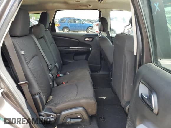 2018 Dodge Journey SXT z VIN 3C4PDDBG6JT390367, wystawiony jako Copart lot #60814775 z przebiegiem 119 473 mil mil oraz Szkoda całkowita • Salvage title. Historia ofert i sprzedaży dostępna na DreamBid. Obrazek 11.