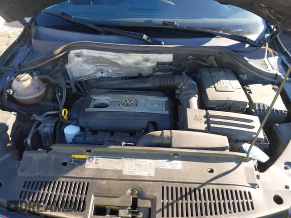 2016 Volkswagen Tiguan S with VIN WVGAV7AX6GW546573, listed as a IAAI auction lot 41672697 with 117,174 mi miles and . Bid and sale history available at DreamBid. Image 10.