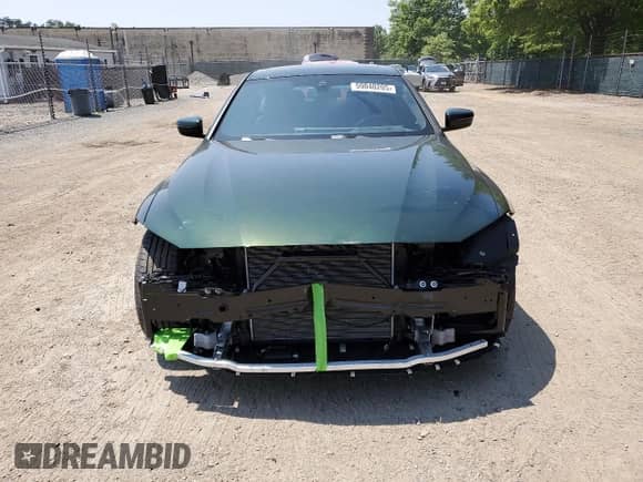 2024 BMW i4 xDrive40 with VIN WBY83FB0XRFS41194, listed as a Copart auction lot 59040205 with 11,719 mi miles and Salvage title. Bid and sale history available at DreamBid. Image 5.