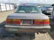 1990 Honda Accord LX z VIN JHMCB7659LC064137, wystawiony jako Copart lot #45761615 z przebiegiem 382 195 mil mil oraz Nie do naprawy • Non repairable. Historia ofert i sprzedaży dostępna na DreamBid. Obrazek 6.