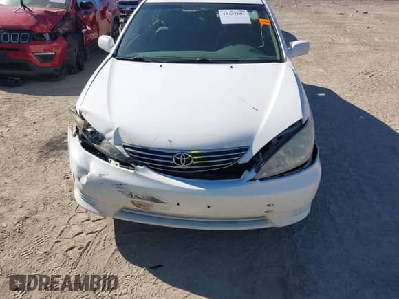 2005 Toyota Camry XLE z VIN 4T1BE32K65U595880, wystawiony jako IAAI lot #43437601 z przebiegiem 221 519 mil mil oraz . Historia ofert i sprzedaży dostępna na DreamBid. Obrazek 12.