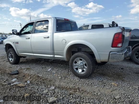 2010 Dodge 3500 Laramie с VIN 3D73Y3CL6AG133877, выставлен на аукционе Copart как лот 74328964 с пробегом 176 677 миль миль и Чистый • Clean title. История ставок и продаж доступна на DreamBid. Изображение 2.