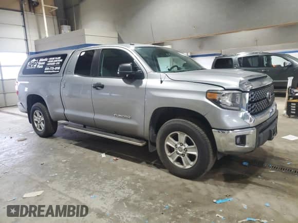 2019 Toyota Tundra SR с VIN 5TFUM5F1XKX081988, выставлен на аукционе Copart как лот 54347595 с пробегом 169 466 миль миль и Списание • Salvage title. История ставок и продаж доступна на DreamBid. Изображение 4.