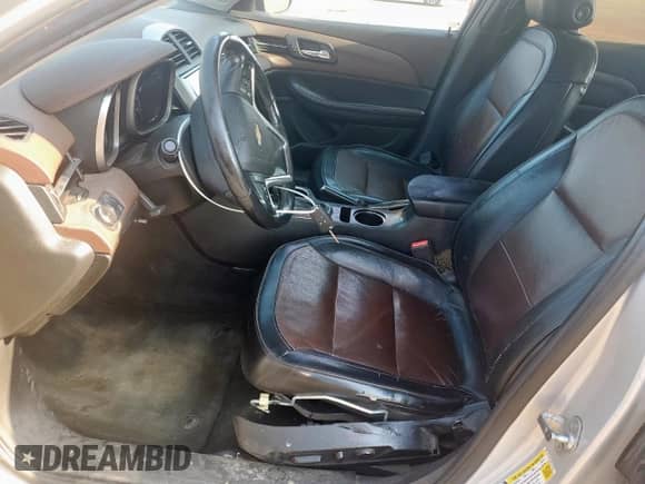 2014 Chevrolet Malibu LTZ with VIN 1G11H5SL9EF231686, listed as a Copart auction lot 67979875 with 189,334 mi miles and Salvage title. Bid and sale history available at DreamBid. Image 7.