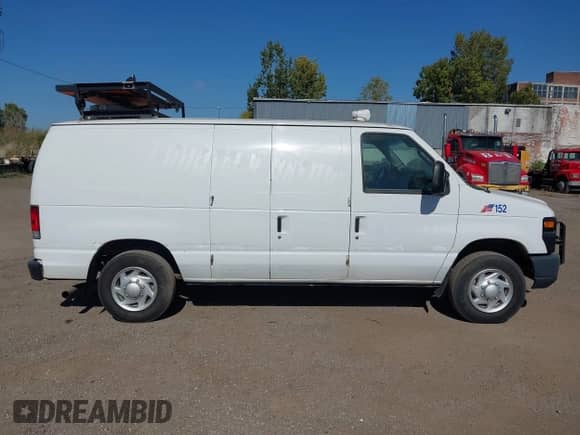 2014 Ford Econoline Cargo Commercial with VIN 1FTNE1EL7EDA59384, listed as a IAAI auction lot 43391909 with 306,342 mi miles and . Bid and sale history available at DreamBid. Image 12.