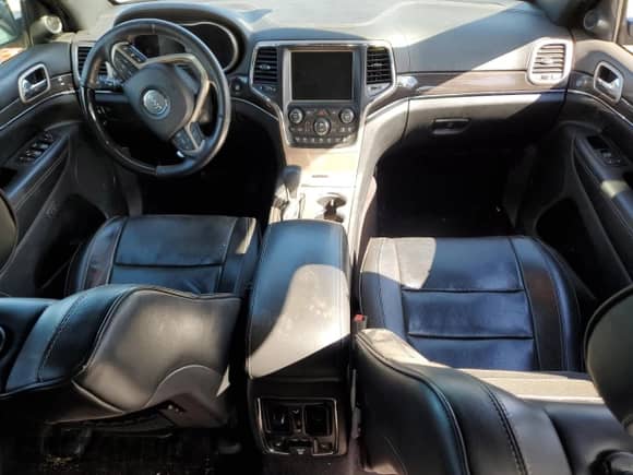 2017 Jeep Grand Cherokee Overland with VIN 1C4RJFCG3HC694208, listed as a Copart auction lot 71187645 with 67,455 mi miles and Salvage title. Bid and sale history available at DreamBid. Image 8.