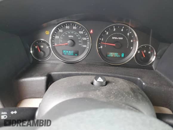 2007 Jeep Commander Limited with VIN 1J8HG58P07C529284, listed as a Copart auction lot 58814305 with 161,686 mi miles and Salvage title. Bid and sale history available at DreamBid. Image 9.