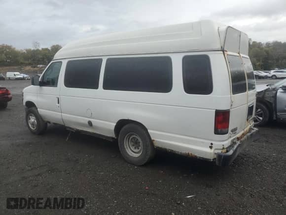 2014 Ford Econoline Cargo Commercial with VIN 1FTNS2EW9EDA51148, listed as a Copart auction lot 87183575 with 266,833 mi miles and Clean title. Bid and sale history available at DreamBid. Image 2.