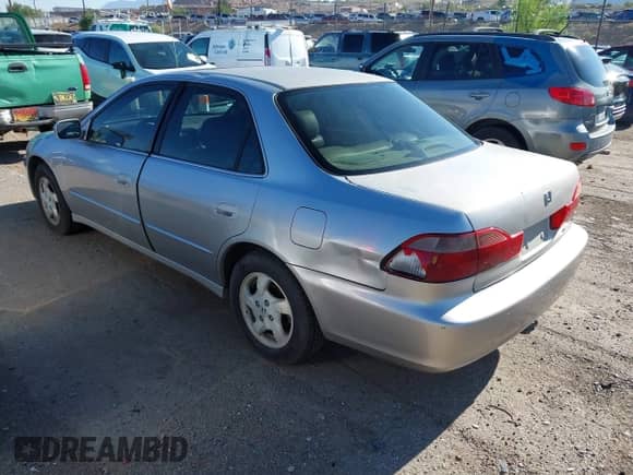 1999 Honda Accord EX with VIN 1HGCG6677XA032966, listed as a IAAI auction lot 43132911 with 219,402 mi miles and . Bid and sale history available at DreamBid. Image 3.