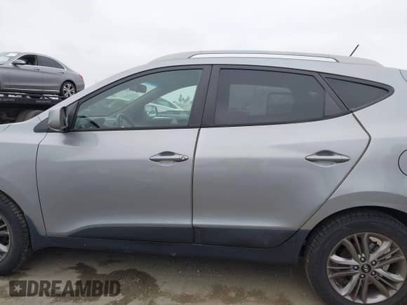 2014 Hyundai Tucson SE with VIN KM8JU3AG5EU797427, listed as a IAAI auction lot 42791661 with 83,738 mi miles and . Bid and sale history available at DreamBid. Image 15.