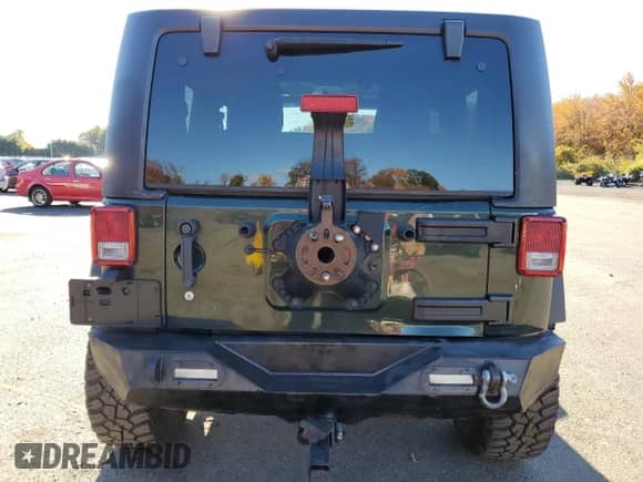 2012 Jeep Wrangler Sport with VIN 1C4AJWAG5CL113509, listed as a Copart auction lot 87483435 with 173,046 mi miles and Clean title. Bid and sale history available at DreamBid. Image 6.