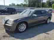 2013 Chrysler 300 C с VIN 2C3CCAET0DH630877, выставлен на аукционе Copart как лот 62955225 с пробегом 98 747 миль миль и Чистый • Clean title. История ставок и продаж доступна на DreamBid. Изображение 1.