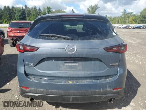 2023 Mazda CX-5 S Carbon Edition z VIN JM3KFBCM1P0249281, wystawiony jako Copart lot #70537745 z przebiegiem 22 623 mil mil oraz Szkoda całkowita • Salvage title. Historia ofert i sprzedaży dostępna na DreamBid. Obrazek 6.