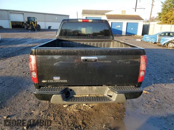 2012 Chevrolet Colorado Work Truck with VIN 1GCESBF94C8144397, listed as a Copart auction lot 87052515 with 95,568 mi miles and Salvage title. Bid and sale history available at DreamBid. Image 6.