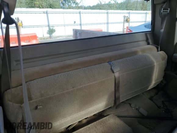1994 GMC Sierra 1500 with VIN 2GTEK19K1R1548357, listed as a Copart auction lot 82556885 with 157,548 mi miles and Clean title. Bid and sale history available at DreamBid. Image 10.