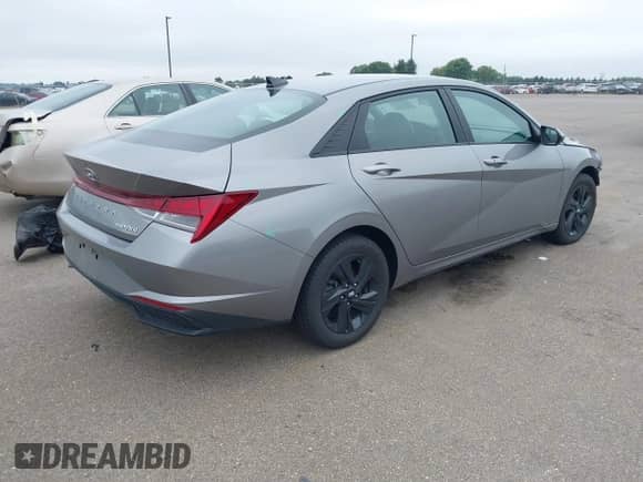 2023 Hyundai Elantra Blue with VIN KMHLM4AJ9PU033657, listed as a IAAI auction lot 43280223 with 37,720 mi miles and . Bid and sale history available at DreamBid. Image 4.