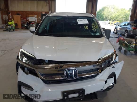 2022 Honda Pilot EX-L with VIN 5FNYF6H53NB081766, listed as a IAAI auction lot 42615459 with 39,878 mi miles and . Bid and sale history available at DreamBid. Image 12.