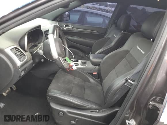 2021 Jeep Grand Cherokee Trackhawk z VIN 1C4RJFN9XMC842590, wystawiony jako Copart lot #58336885 z przebiegiem Nie podano mil oraz Szkoda całkowita • Salvage title. Historia ofert i sprzedaży dostępna na DreamBid. Obrazek 7.