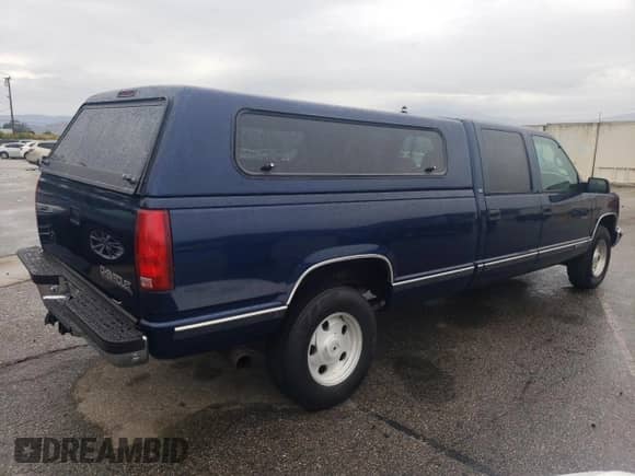 1998 Chevrolet Silverado 3500 с VIN 1GCGC33J7WF007299, выставлен на аукционе Copart как лот 81253215 с пробегом 92 596 миль миль и Списание • Salvage title. История ставок и продаж доступна на DreamBid. Изображение 3.