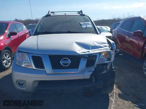 2018 Nissan Frontier SV z VIN 1N6AD0EV4JN749480, wystawiony jako IAAI lot #41892549 z przebiegiem 115 414 mil mil oraz . Historia ofert i sprzedaży dostępna na DreamBid. Obrazek 12.
