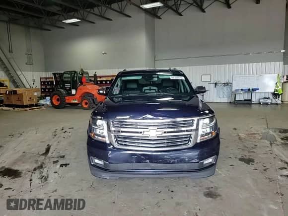 2018 Chevrolet Tahoe Premier with VIN 1GNSKCKC1JR186910, listed as a Copart auction lot 68302015 with 99,990 mi miles and Salvage title. Bid and sale history available at DreamBid. Image 14.