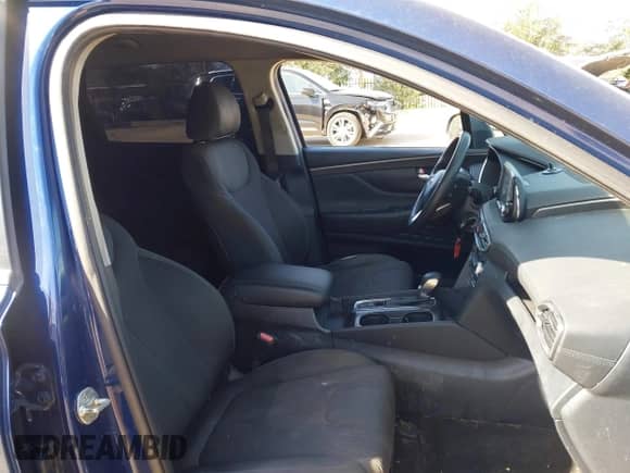 2020 Hyundai Santa Fe SE with VIN 5NMS23AD0LH141404, listed as a IAAI auction lot 41870350 with 144,109 mi miles and . Bid and sale history available at DreamBid. Image 5.