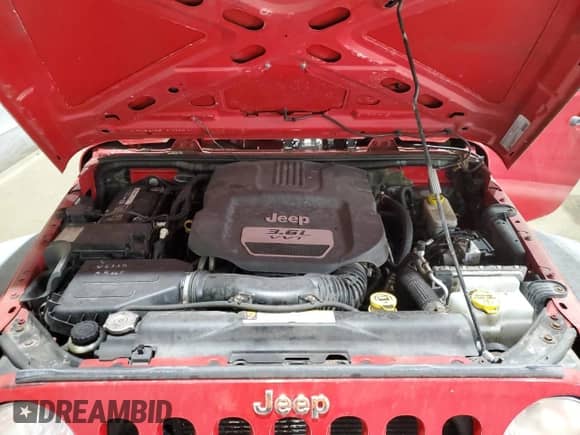 2012 Jeep Wrangler Sport with VIN 1C4AJWAG2CL135192, listed as a Copart auction lot 64013735 with 120,891 mi miles and Clean title. Bid and sale history available at DreamBid. Image 11.