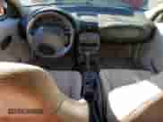 1999 Saturn SC с VIN 1G8ZN1283XZ283513, выставлен на аукционе Copart как лот 41760055 с пробегом Не указан миль и Списание • Salvage title. История ставок и продаж доступна на DreamBid. Изображение 8.