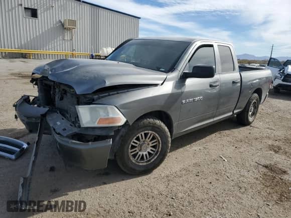 2011 Ram 1500 ST with VIN 1D7RB1GK4BS597407, listed as a Copart auction lot 87227454 with 224,398 mi miles and Salvage title. Bid and sale history available at DreamBid. Image 1.