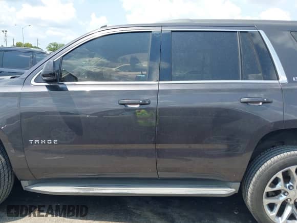 2015 Chevrolet Tahoe LT with VIN 1GNSCBKC6FR138401, listed as a IAAI auction lot 42940030 with 241,046 mi miles and . Bid and sale history available at DreamBid. Image 14.