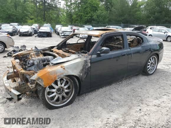 2007 Dodge Charger SRT-8 с VIN 2B3LA73W87H709964, выставлен на аукционе Copart как лот 53842095 с пробегом Не указан миль и Списание • Salvage title. История ставок и продаж доступна на DreamBid. Изображение 1.