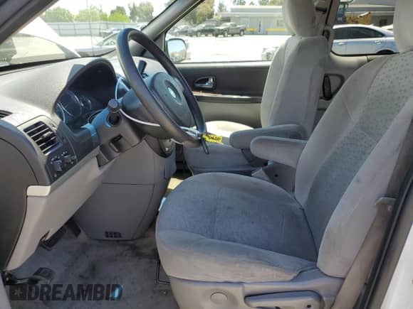2006 Chevrolet Uplander LS Fleet z VIN 1GNDV23L66D240182, wystawiony jako Copart lot #57594395 z przebiegiem 164 167 mil mil oraz Szkoda całkowita • Salvage title. Historia ofert i sprzedaży dostępna na DreamBid. Obrazek 7.