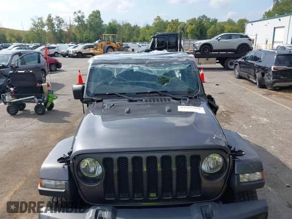 2022 Jeep Wrangler Unlimited Sahara Altitude with VIN 1C4HJXEG3NW148940, listed as a IAAI auction lot 43265258 with 53,047 mi miles and . Bid and sale history available at DreamBid. Image 13.