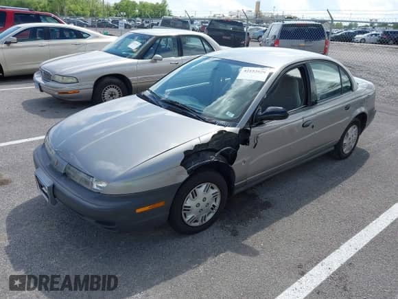 1997 Saturn SL with VIN 1G8ZH5285VZ117635, listed as a IAAI auction lot 42153929 with 193,224 mi miles and . Bid and sale history available at DreamBid. Image 2.